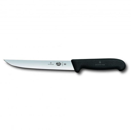 Victorinox 18cm carving knife with narrow blade and ergonomic black Fibrox handle for precise cutting of meats and vegetables.