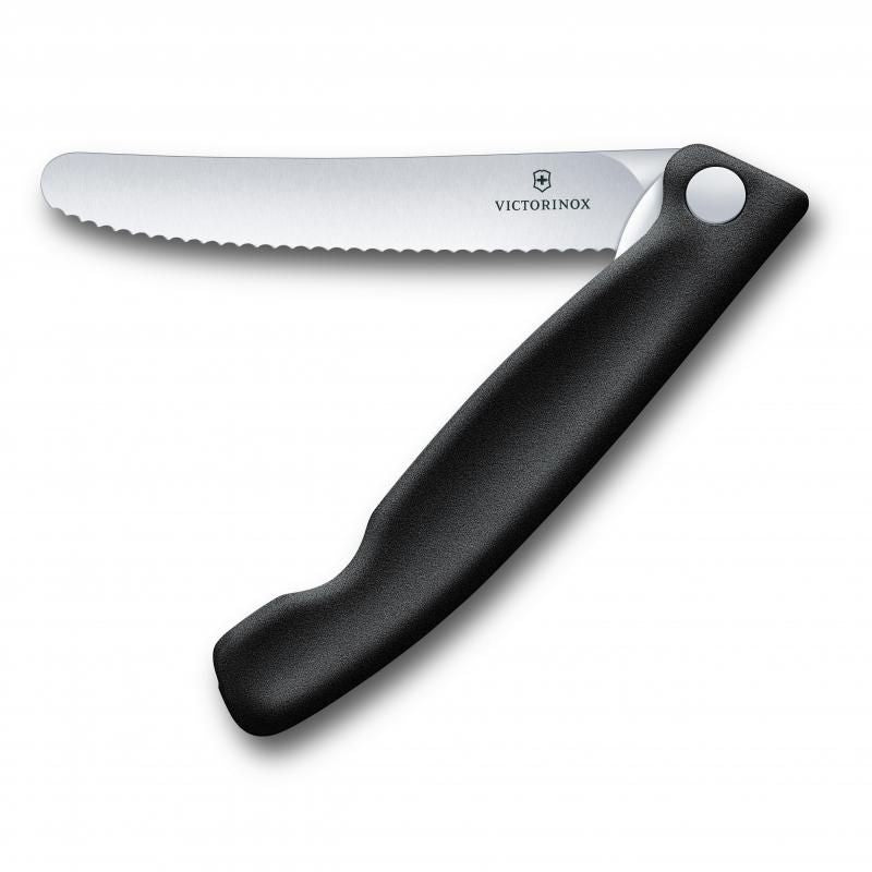 Compact black folding steak knife with serrated stainless steel blade, ideal for picnics and effortless meat slicing.