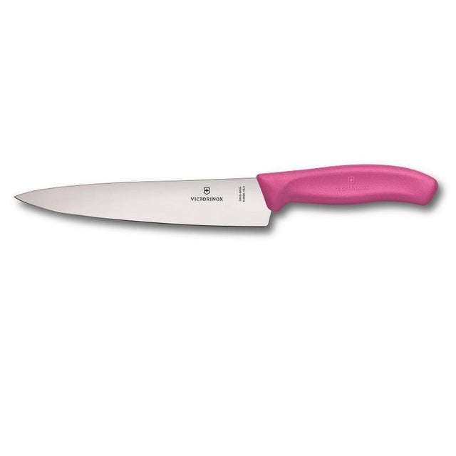 Victorinox 19cm pink carving knife with a wide stainless steel blade and ergonomic handle, perfect for slicing meats and veggies.