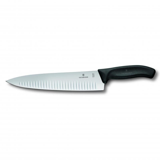 Victorinox 25cm carving knife with fluted blade, ergonomic black handle for precise, effortless slicing of meats and produce.