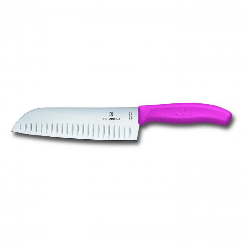 Victorinox 17cm Santoku knife with fluted blade, ergonomic pink handle, perfect for slicing, dicing, and mincing in the kitchen.