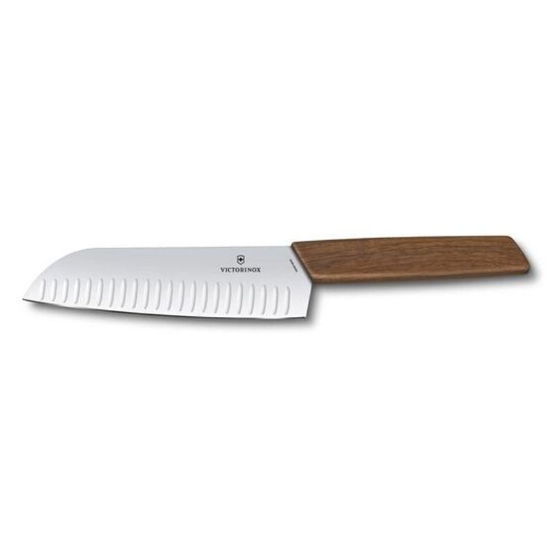 Victorinox Swiss Modern 17cm Santoku knife with a fluted blade and walnut handle for precision slicing of meats, fruits, and vegetables.