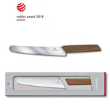 Victorinox Swiss Modern 22cm bread and pastry knife with walnut wood handle, featuring a wavy precision edge for effortless slicing.