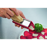 Versatile Victorinox Handslicer with double-edged slicer, julienne, grater, and ergonomic red handle for easy food prep.