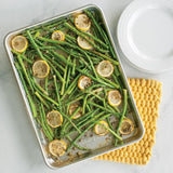 Nordic Ware Naturals® Jelly Roll Pan, durable aluminum with galvanized steel rims for even baking and easy cleanup.