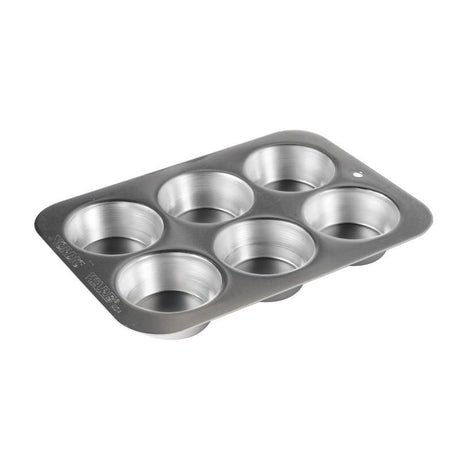 Nordic Ware Naturals compact muffin pan with 6 cavities for perfect muffins, made of durable natural aluminum for even baking.