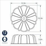 Nordic Ware 12 Cup Formed Bundt® Pan in vibrant red, made of durable aluminum for even baking and easy cake release.