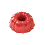 Nordic Ware 6 Cup Formed Bundt® Pan in red, ideal for baking stunning desserts with even heat distribution.