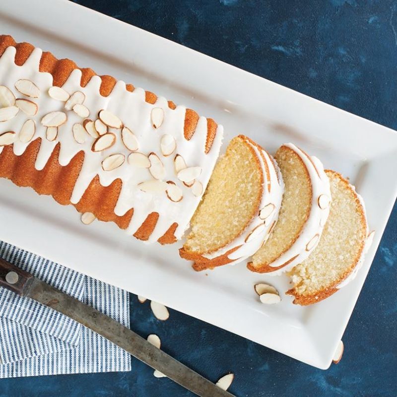 Nordic Ware loaf pan for baking cinnamon bread and almond cakes, featuring ribbed design and even heat distribution.