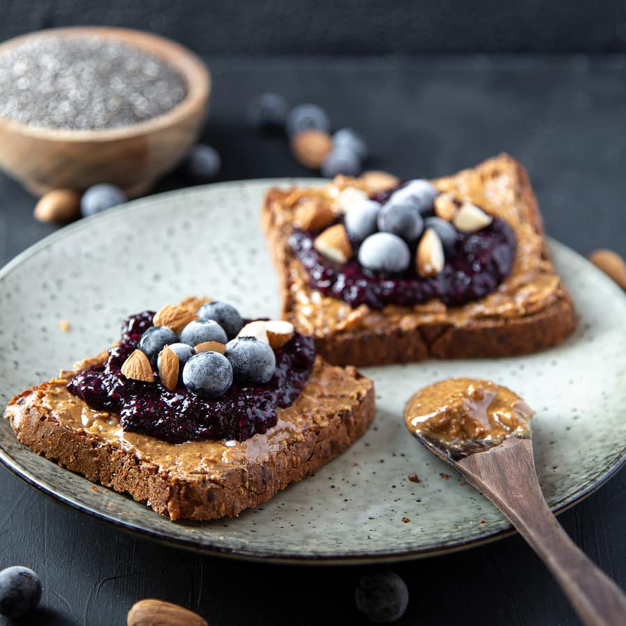 Forty Thieves Almond Butter Smooth in a 500g recycled glass jar, featuring a rich texture and made from non-GMO almonds.