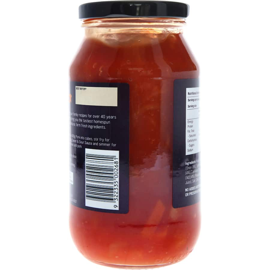 Madewell Meal Base Sweet & Sour Simmer Sauce in a bottle, showcasing vibrant colors and a perfect blend for delicious meals.