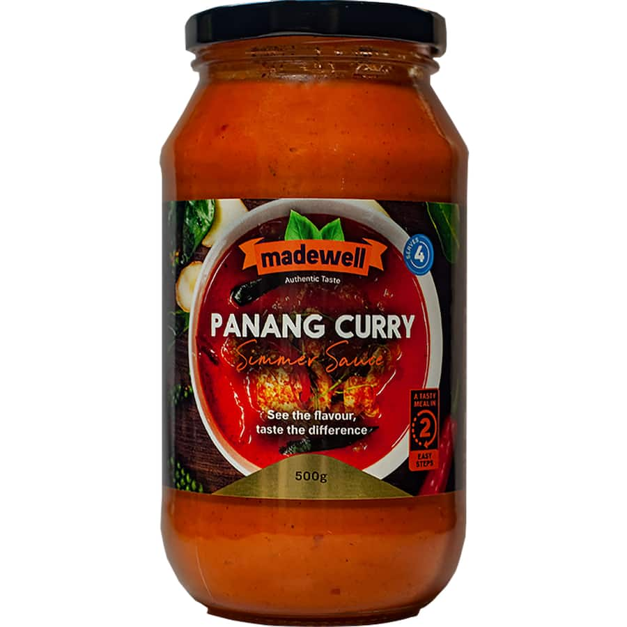 Madewell Simmer Sauce Panang Curry bottle showcasing rich coconut milk and vibrant spices for authentic Thai flavor.