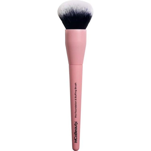 Kabuki-style foundation brush with soft, cruelty-free bristles for seamless application of liquid, cream, or powder makeup.