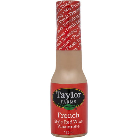 Taylor Farms French Dressing Red Wine Vinaigrette bottle, gluten-free and flavorful, perfect for enhancing salads.