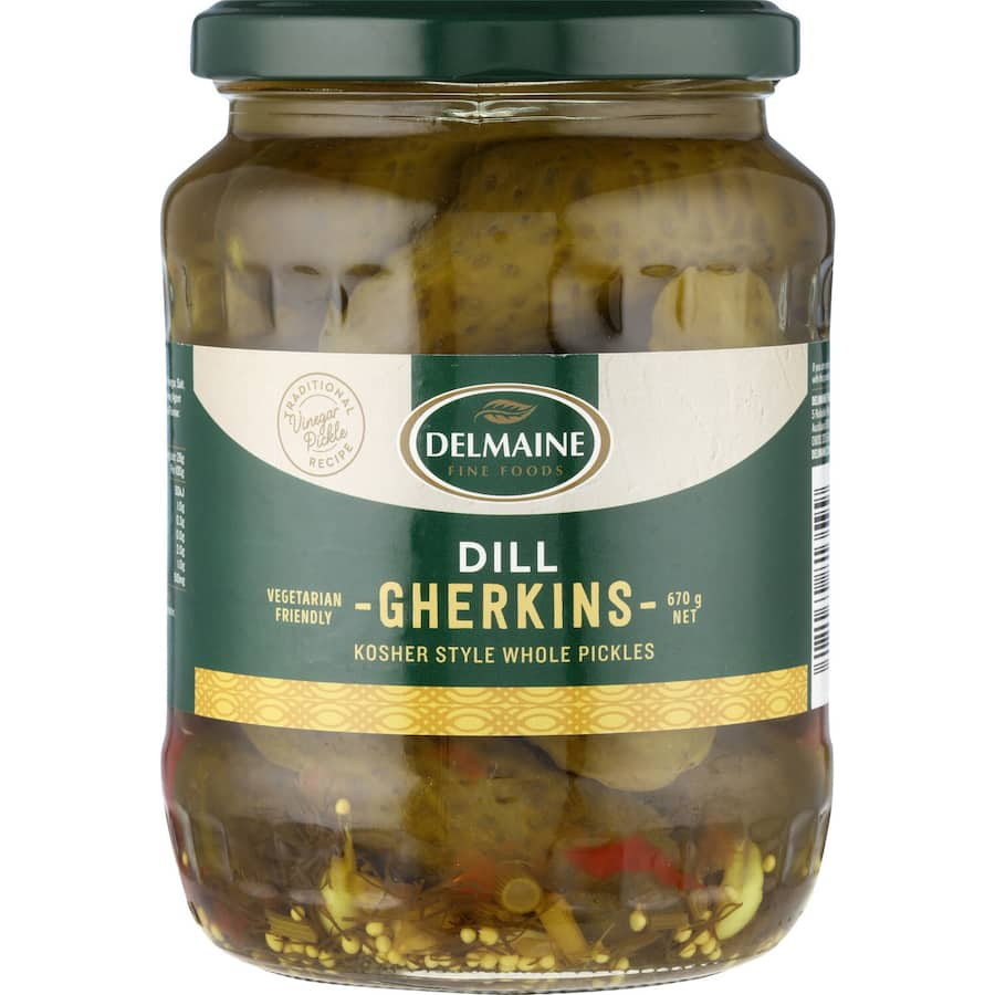 Crispy Delmaine Dill Gherkins infused with garlic and dill, perfect for burgers, sandwiches, or standalone snacking.