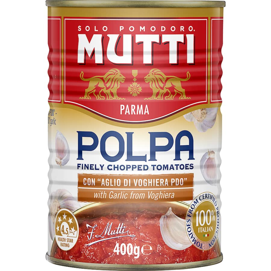 Chopped Mutti Polpa tomatoes with garlic, enhancing Italian dishes with rich flavor and natural sweetness.