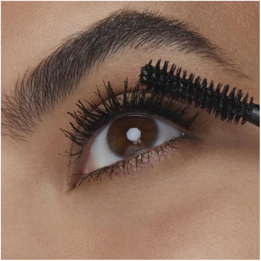 Maybelline The Falsies Lash Lift Mascara in Ultra Black delivers dramatic volume and lifted lashes with a unique double-curved brush.