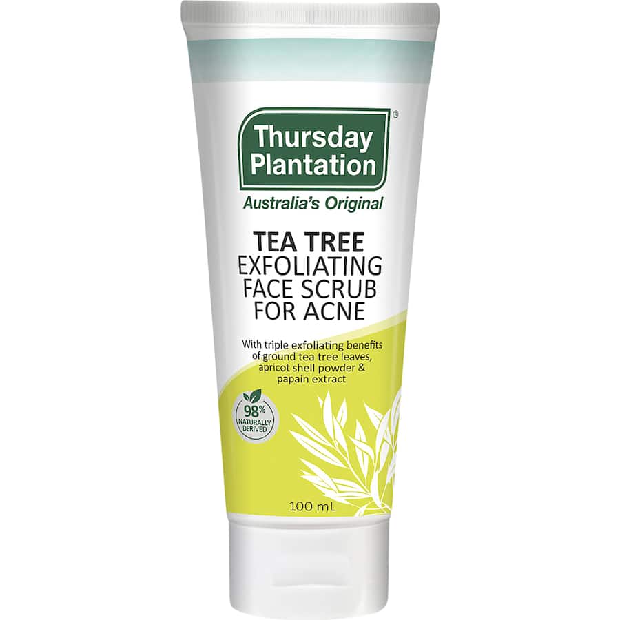 Exfoliating face scrub with tea tree oil, apricot powder, and papain, revitalizing and rejuvenating all skin types.