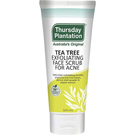 Exfoliating face scrub with tea tree oil, apricot powder, and papain, revitalizing and rejuvenating all skin types.