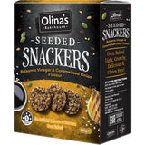 Olina's Bakehouse Seeded Crackers with Balsamic Vinegar & Onion, offering a gourmet crunch and unique flavor for any snack occasion.