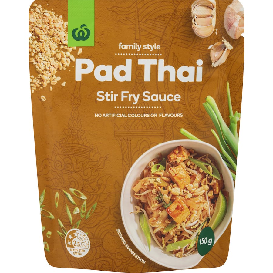 Bottle of Woolworths Stir Fry Sauce Pad Thai, featuring tangy tamarind, garlic, and fish sauce for quick, authentic Thai meals.