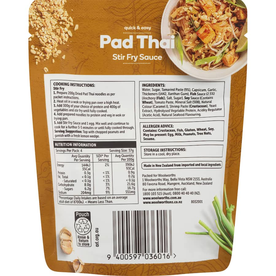 Bottle of Woolworths Stir Fry Sauce Pad Thai featuring a blend of tamarind, garlic, and fish sauce for easy Thai cuisine at home.