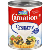 Creamy Carnation Evaporated Milk in a can, perfect for enhancing cooking and baking with rich flavor and smooth texture.