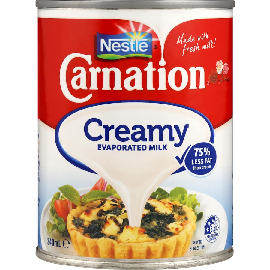 Rich and creamy Carnation Evaporated Milk, perfect for cooking, baking, and enhancing flavors in your favorite recipes.