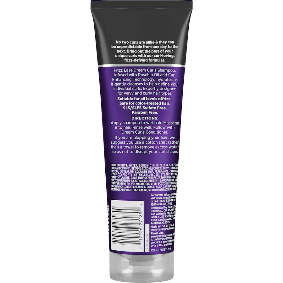 John Frieda Frizz Ease Dream Curls Shampoo transforms frizzy hair into smooth, defined curls with jojoba oil and silicones.