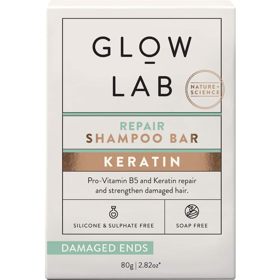 Eco-friendly Glow Lab shampoo bar for damaged hair, infused with keratin, Pro-Vitamin B5, and avocado oil for revitalizing care.