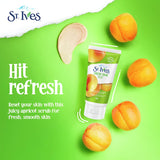 St Ives Invigorating Apricot Scrub, a gentle exfoliant with natural walnut shell and apricot extracts for radiant, smooth skin.