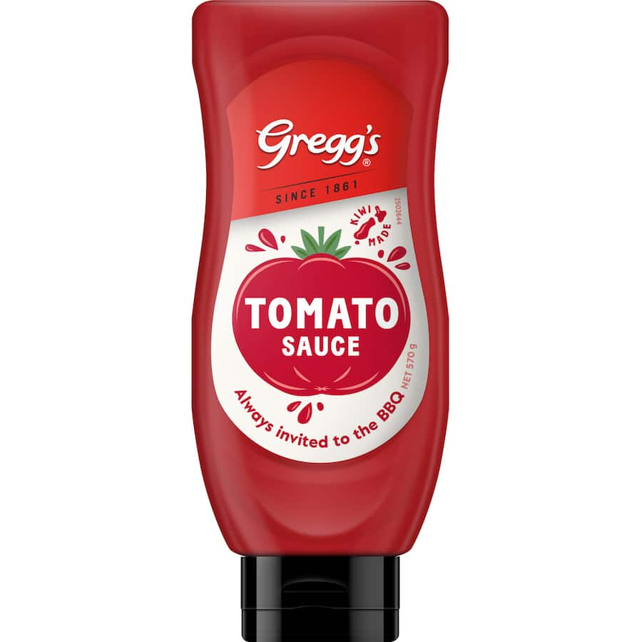 Squeeze bottle of Greggs Upside Down Tomato Sauce, featuring rich tomato flavor and spices, perfect for various dishes.