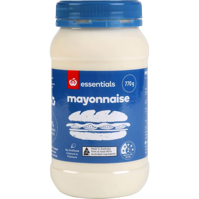 Creamy Essentials Mayonnaise in a 770g jar, made with 85% Australian ingredients, perfect for enhancing meals.