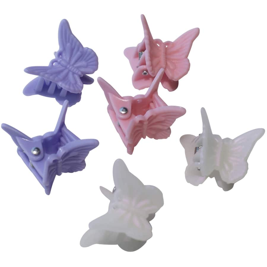 Stunning pink and purple butterfly hair clips for stylish flair and secure hold, perfect for all hair types and occasions.