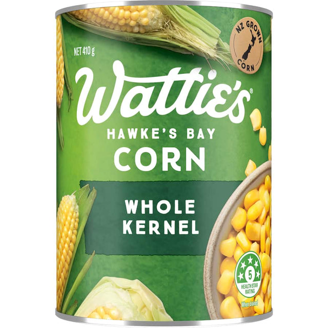 A can of Wattie's Corn Whole Kernel, showcasing vibrant yellow corn, perfect for enhancing salads, tacos, and pasta dishes.