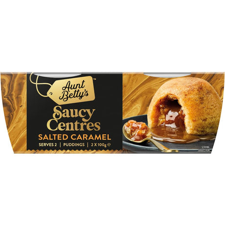 Salted caramel oozes from Aunt Betty's light sponge pudding, offering a delicious and nostalgic dessert experience.