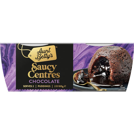 Indulgent Aunt Betty's chocolate steamed pudding with a light sponge and rich, gooey chocolate center, perfect for dessert lovers.