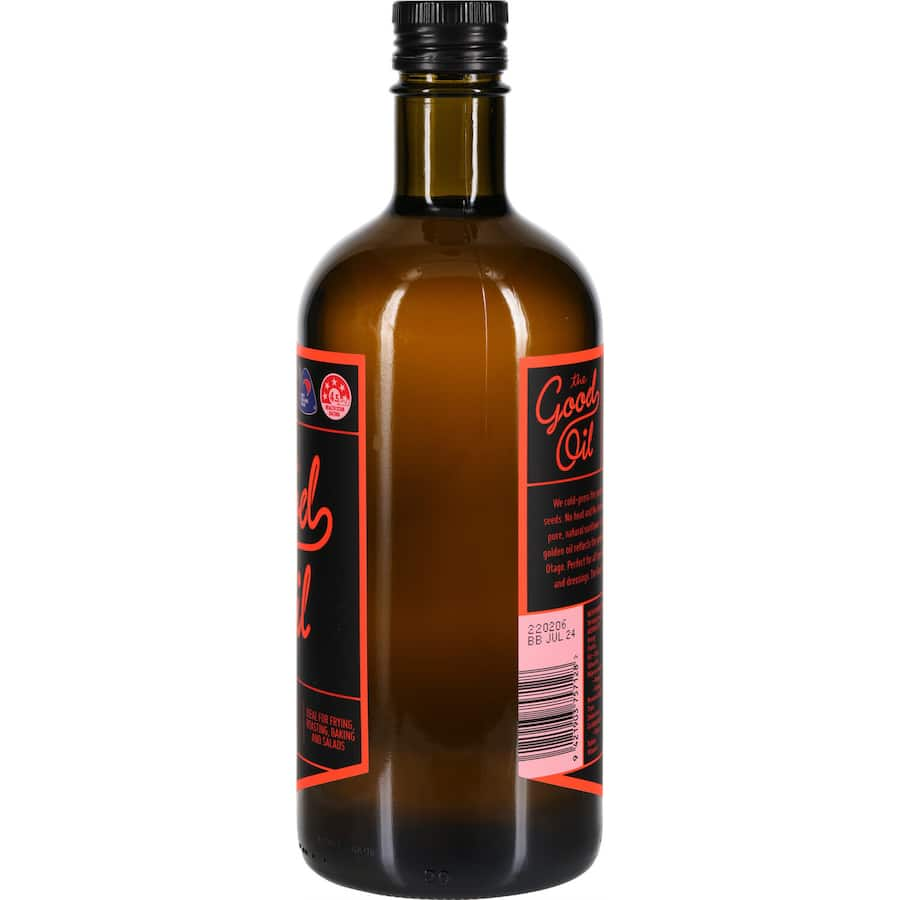 Golden sunflower oil in a bottle, cold-pressed for flavor and nutrition, ideal for cooking, dressings, and healthy meals.