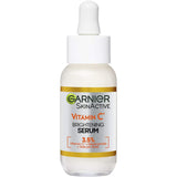 Garnier Skin Active Anti-Dark Spot Serum bottle featuring Vitamin C, Niacinamide, and Salicylic Acid for brighter skin.