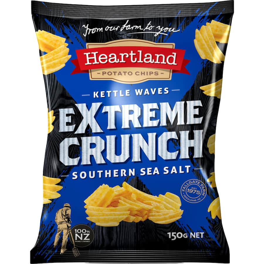 Heartland Extreme Crunch Chips with Southern sea salt, showcasing kettle-cooked wave cut potato chips for an irresistible snack.