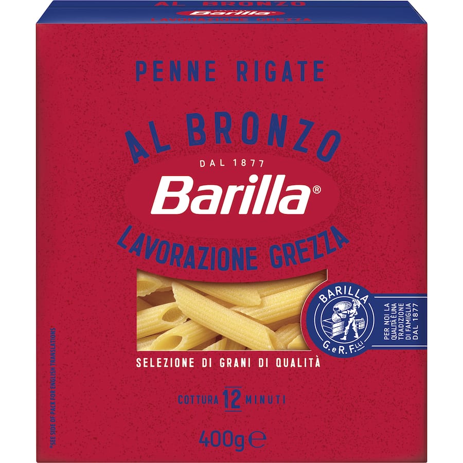 Barilla Al Bronzo Penne Rigate, textured pasta made from 100% durum wheat for perfect sauce adherence and a firm bite.