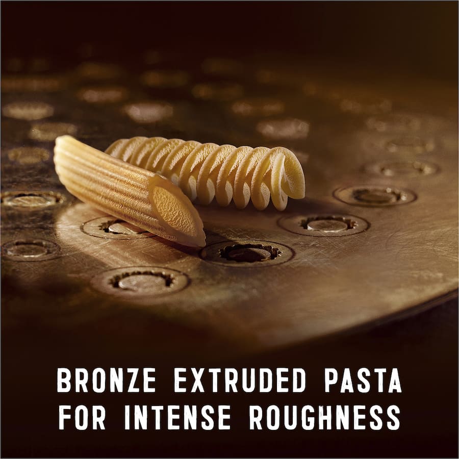 Barilla Al Bronzo Penne Rigate pasta, made from durum wheat, features a textured surface for excellent sauce adherence.