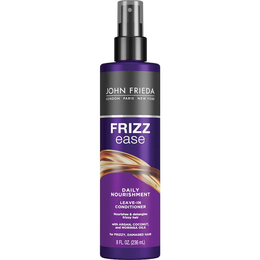 John Frieda Frizz Ease Leave-In Conditioner reduces frizz, nourishes hair, and protects from heat with vitamins and green tea extract.