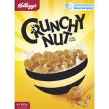 A bowl of Kellogg's Crunchy Nut Cornflakes featuring golden corn flakes, nut pieces, and honey for a nutritious breakfast.