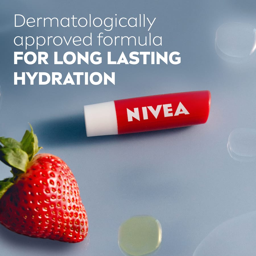 Nivea Fruity Shine Lip Balm Strawberry 4.8g, offering 24-hour hydration, a strawberry scent, and a subtle pink sheen.