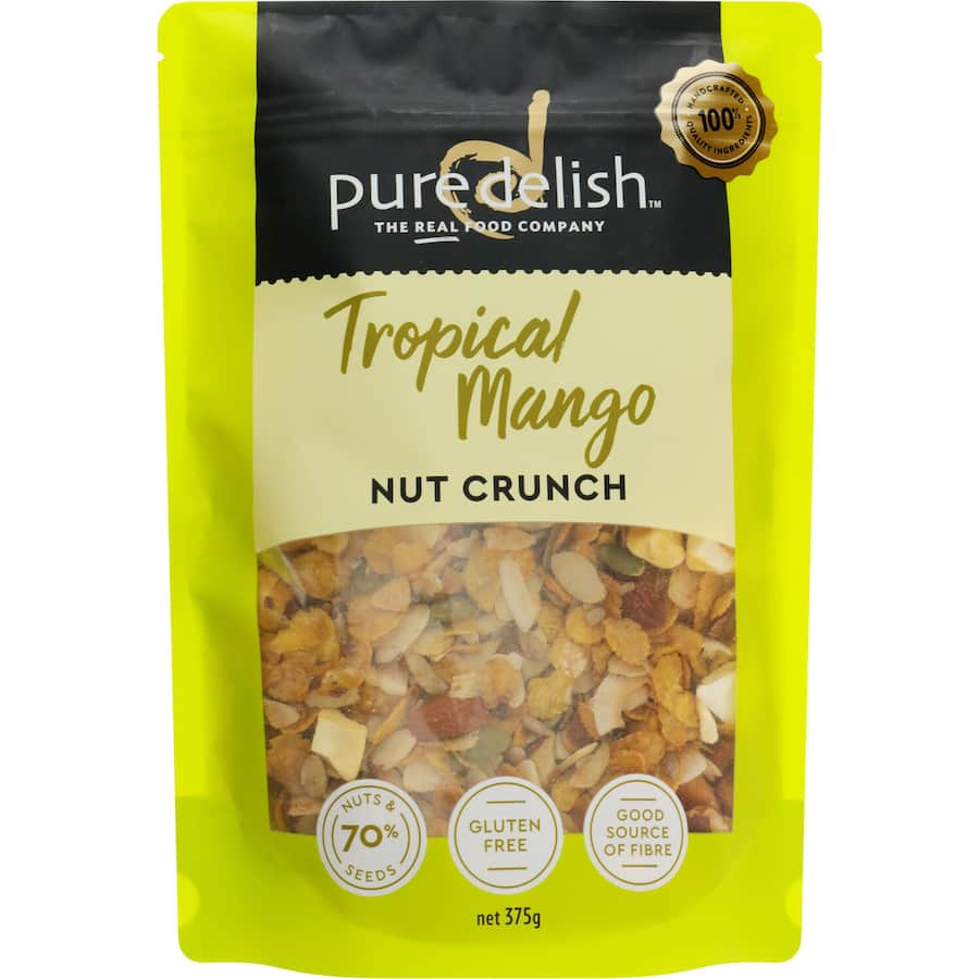 Crunchy nuts and seeds mixed with dried mango in a gluten-free cereal for a nutritious breakfast or snack.