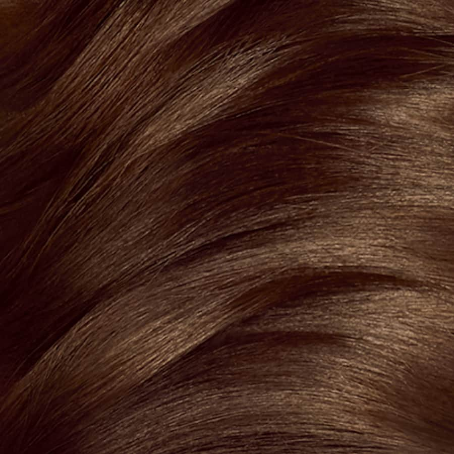 Clairol Nice 'N Easy Medium Caramel Brown hair dye offers vibrant, natural color with 100% grey coverage and shine-enhancing gloss.