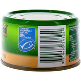 Flaked John West Naturally Smoked Tuna, rich in omega-3, ideal for salads, wraps, or pasta dishes, enhancing meals with flavor.