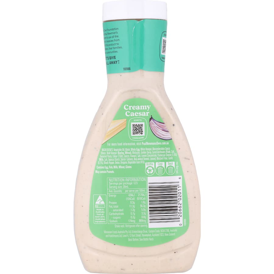 Creamy Caesar dressing by Paul Newman, featuring rich flavor and natural ingredients, perfect for salads and marinades.