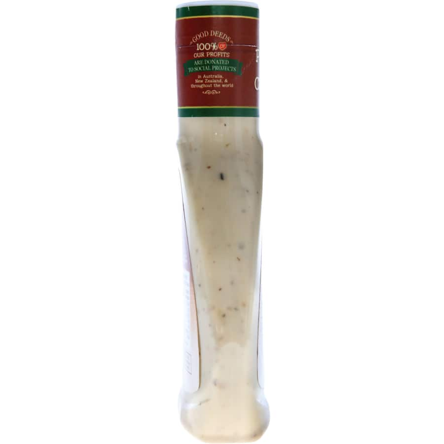 Creamy Caesar dressing by Paul Newman, made with natural ingredients, perfect for salads and marinades.